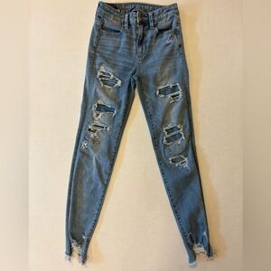 American Eagle 360 Next Level Stretch distressed raw hem jeans size 00